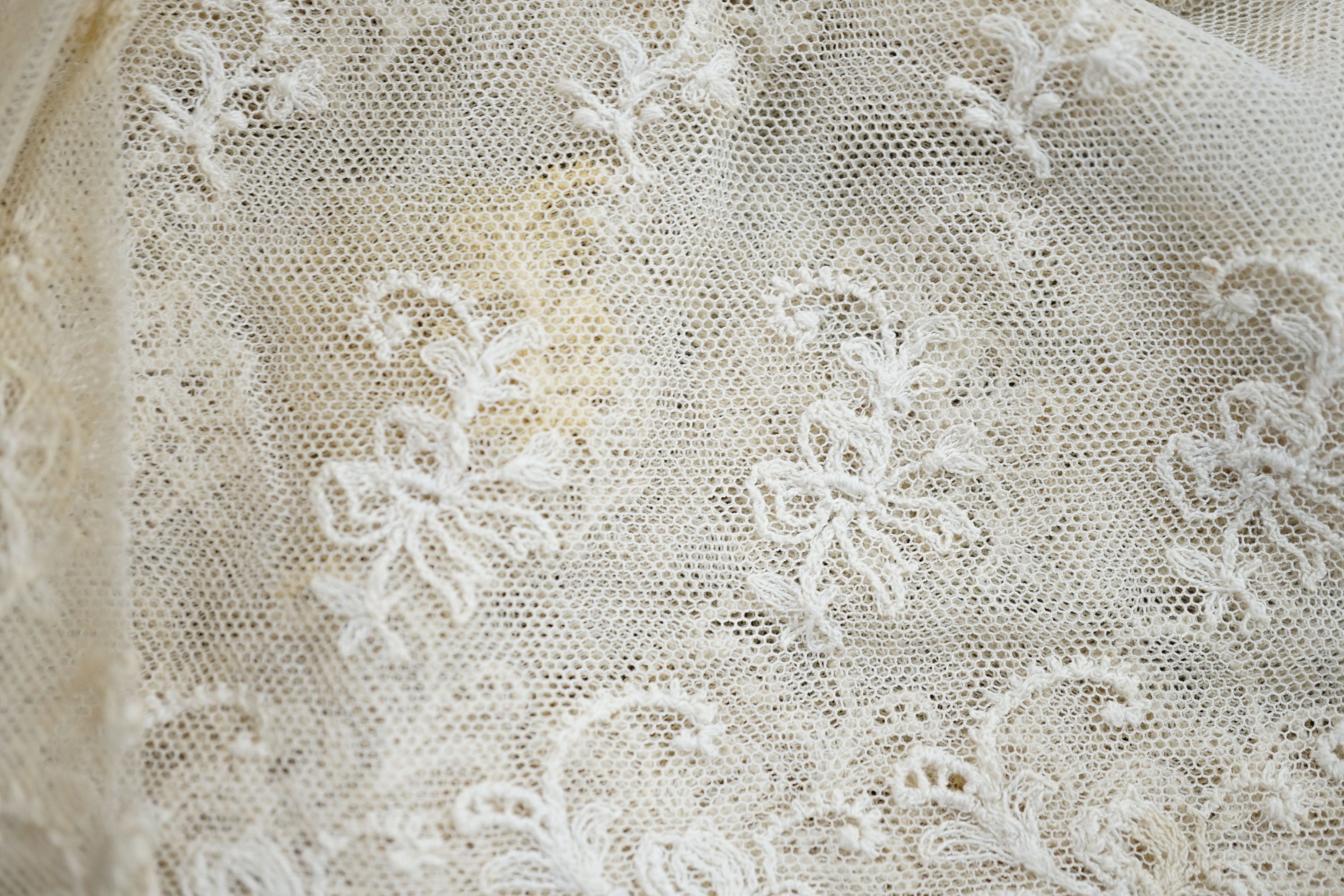 A needle lace skirt panel, a similar stole, various machine laces and trimmings